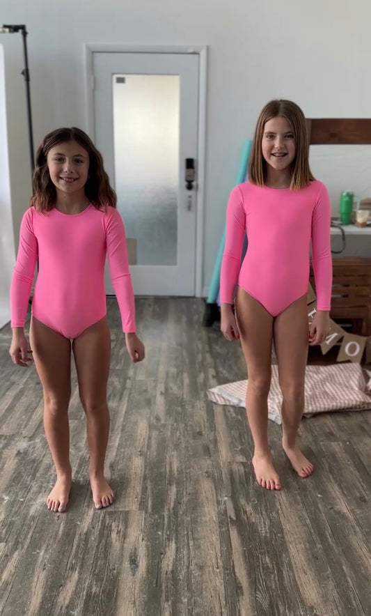 Mesa Long Sleeve Open Back One Piece In Pink