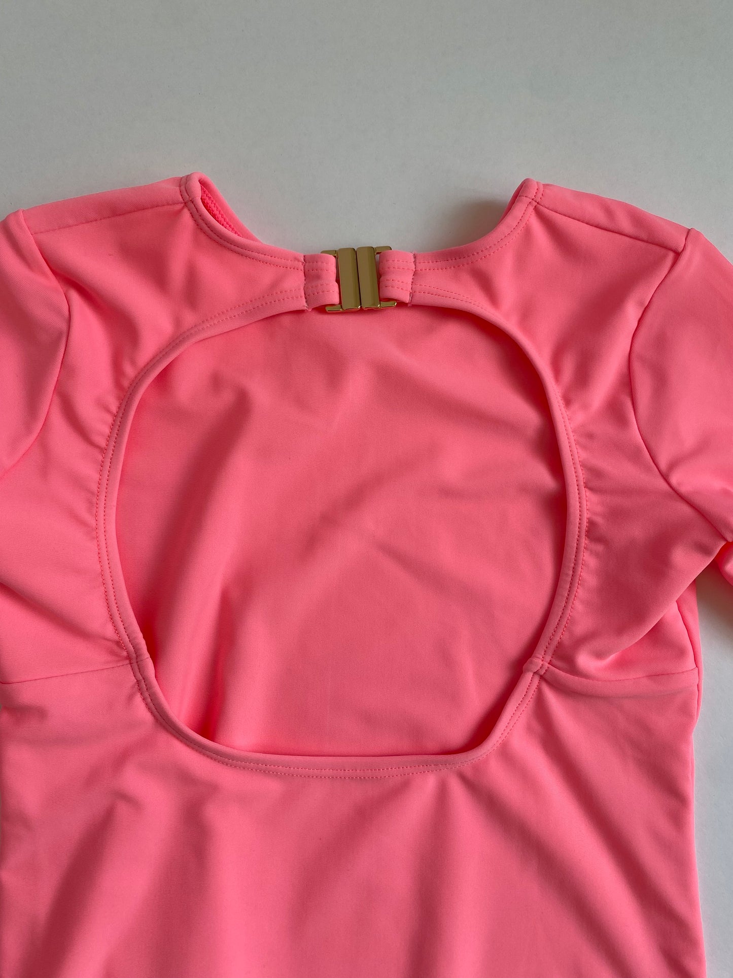 Mesa Long Sleeve Open Back One Piece In Pink