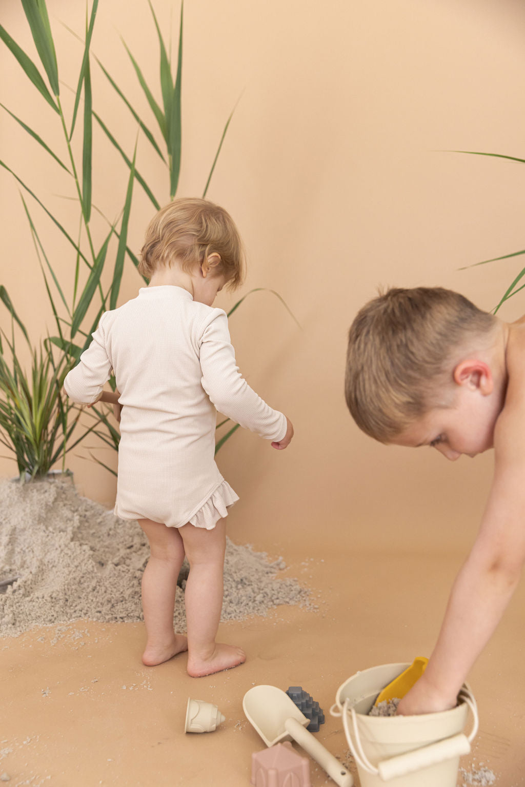 Sahara Ribbed One Piece Zip Up in Cream